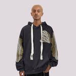 Leo - Hoodie mit Patchwork-Skelett-Grafik