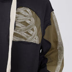 Leo - Hoodie mit Patchwork-Skelett-Grafik