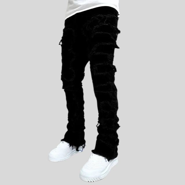 Caspian - Rippede slim-fit jeans med flossede detaljer