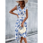 MODA elegant hvid sommerkjole med blomsterprint