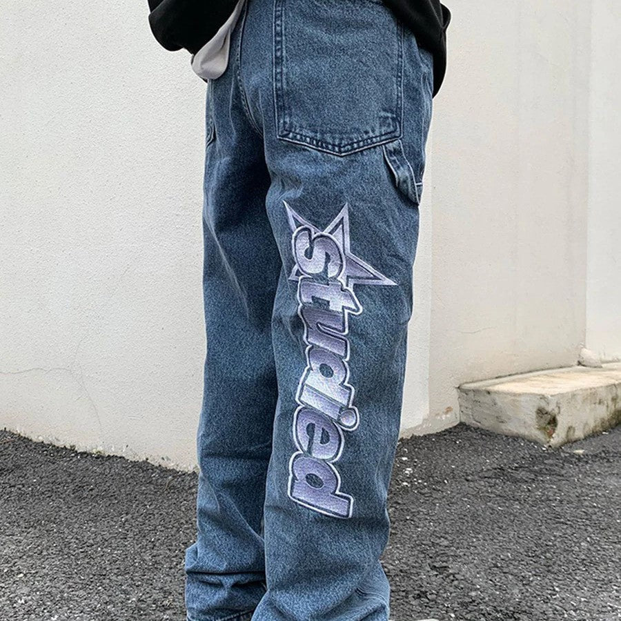 Raven - Weite Jeans mit markantem Grafikdruck